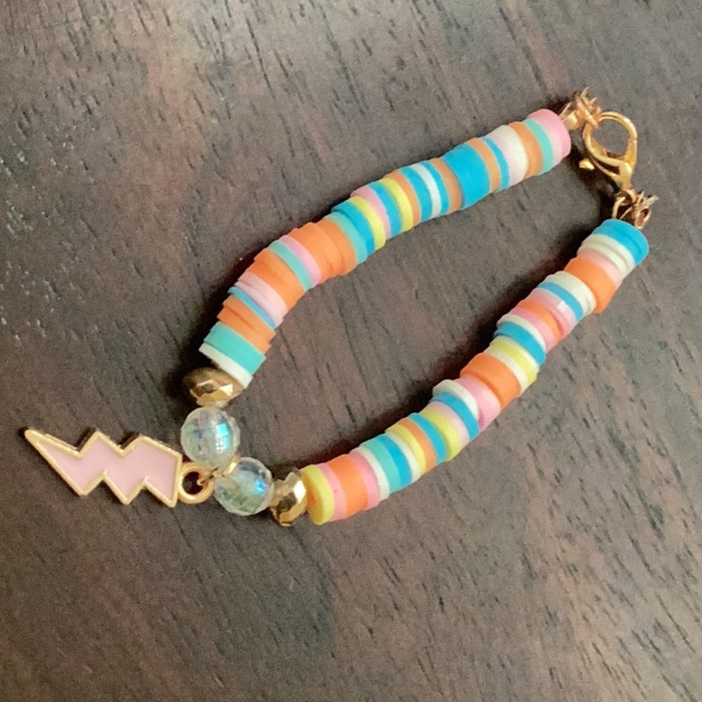 Star earrings and pink lightning  bracelet